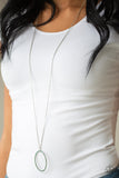 Paparazzi A Dazzling Distraction - Green Rhinestone Necklace