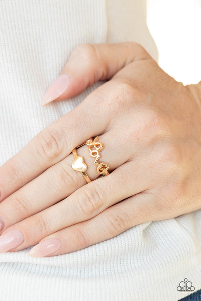 Heartstring Harmony - Gold - Paparazzi Heart Ring - TheSavvyShoppersJewelryStore